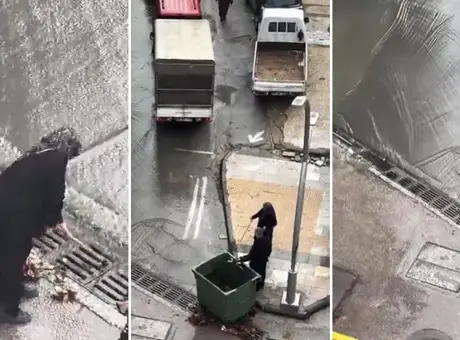 İstanbul'dan yürek ısıtan görüntü! Taşkın oluşmaması için bastonu ile mazgaldaki yaprakları temizledi