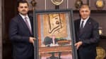 AK Parti heyetinden Cemil Tugay’a Erdoğan portreli hediye